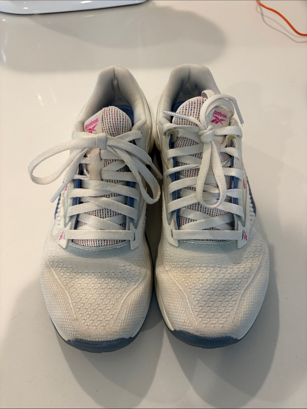 Reebok White Sneakers with Pink Logo and Navy Insole
